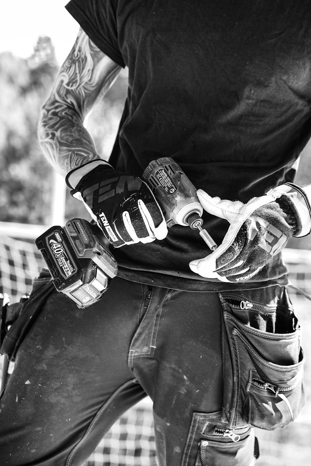 Mastering the First Impression: Your intriguing post title goes here Carpenter with work gloves holding a drill machine.